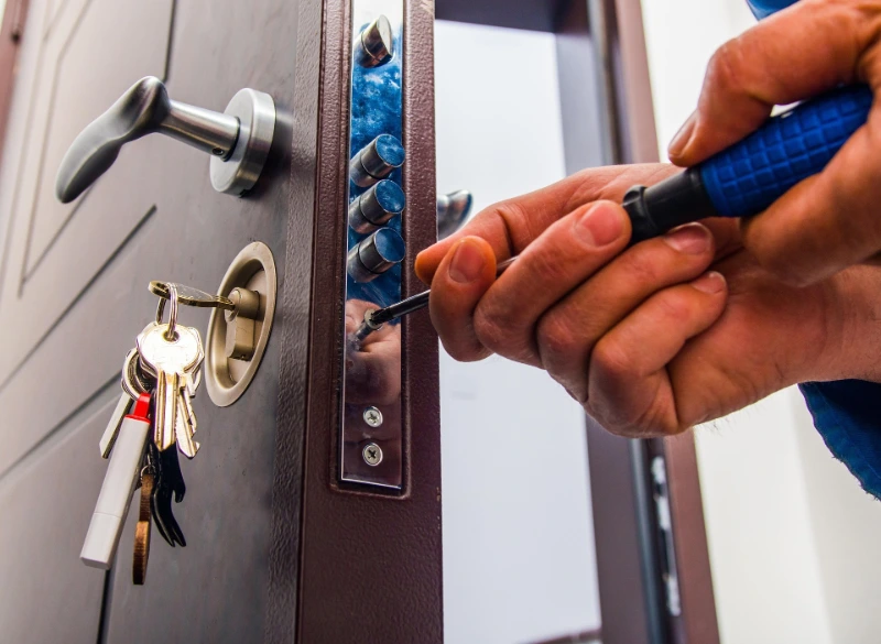 Multi-point locking mechanism being installed on a high-security door in Billings MT